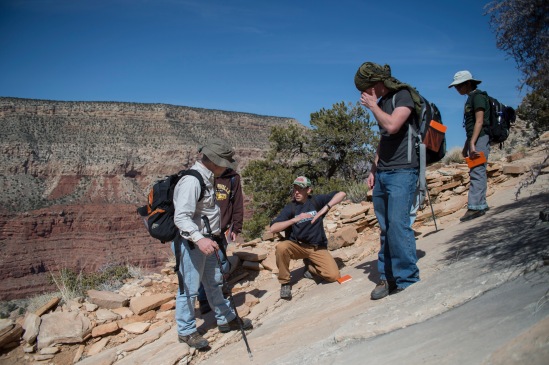 Dr. John Whitmore & students talk about the foot prints tracks in in the sandstone. 